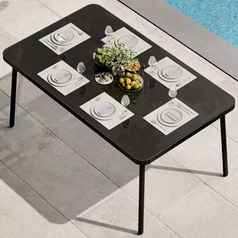 Tavolo da pranzo in ferro con piano in vetro temperato